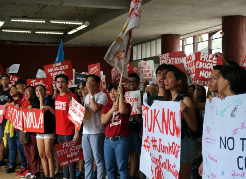 EDUCATION IS A RIGHT. Amidst enrollment period in the University of the Philippines, students gather to protest the continued collection of tuition. 
