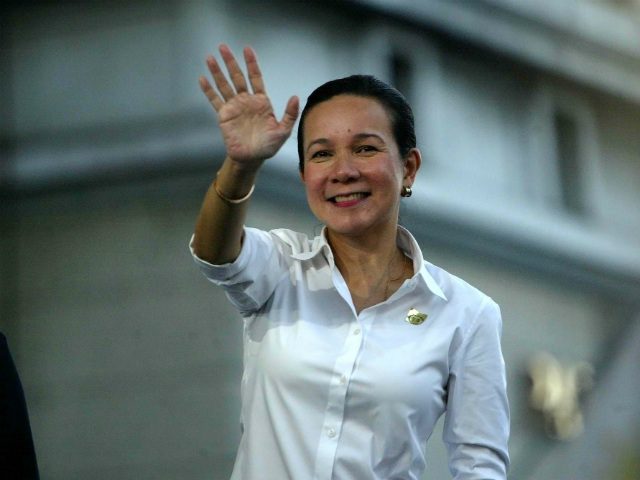 RUNNING FOR PRESIDENT. Senator Grace Poe waves to supporters after filing her certificate of candidacy at the Commission on Elections office in Manila, Philippines, on October 15, 2015. Photo by Francis Malasig/EPA 