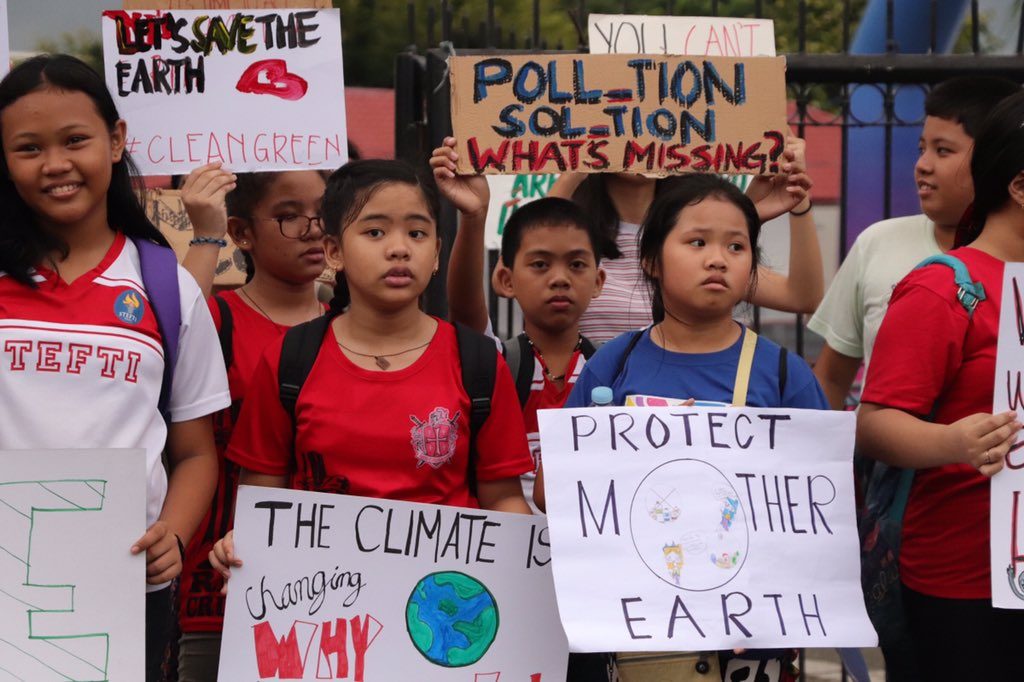 PROTECT MOTHER EARTH. Tacloban youth convene for the national youth strike for climate. Photo by Cherry Tabuena  