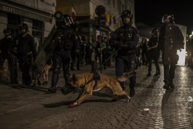 French riot police patrol the streets due to violent skirmishes between football fans following the UEFA EURO 2016 group B match between England and Russia in the port of Marseille, France, 11 June 2016. Photo by OLIVER WEIKEN/EPA 