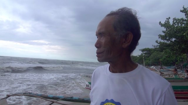 MEMORIES OF YOLANDA. Martin Zambales of Barangay Poblacion still remembers how the super typhoon battered their village in November 2013. Photo by David Lozada/ Rappler 
