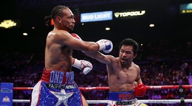 Pacquiao dethrones Thurman for WBA super welter crown