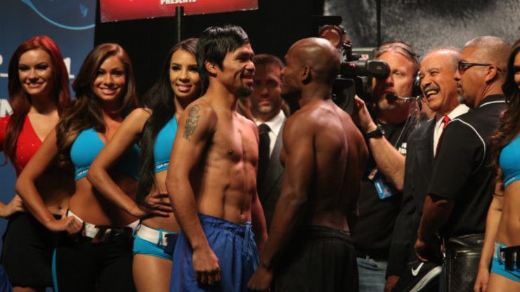 Pacquiao smiles at Bradley as Bradley jacks his jaw off. Photo by Jhay Otamias/Rappler