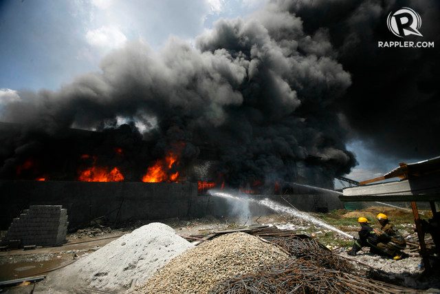 DEADLY BLAZE. A fire razes a slipper factory in Valenzuela City on May 13, 2015. All photos by Ben Nabong/Rappler 