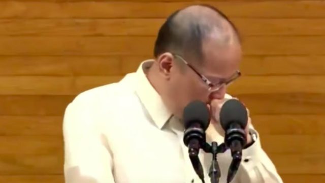 NOT QUITTING. Then president Benigno Aquino III coughs as he delivers his State of the Nation Address. Screenshot from Rappler video 
