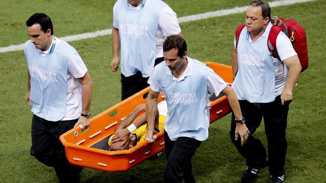 SHATTERED HOPES. Neymar was carried off the pitch on a stretcher after sustaining a fractured vertebra. Photo by Kai Foersterling/EPA