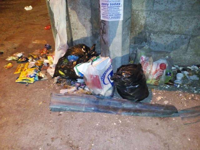 GARBAGE. At a corner of a residential area in Dumaguete, trash is strewn everywhere. Photo by Therene Mari Quijano  