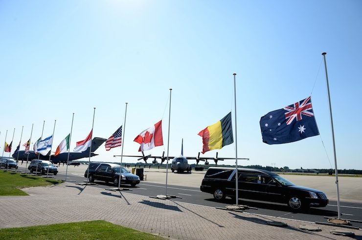 HOME. A procession of hearses carrying the bodies of victims in the Malaysia Airlines flight MH-17 crash, depart after a ceremony at Eindhoven Airbase, the Netherlands, 23 July 2014. Dan Himbrechts/EPA