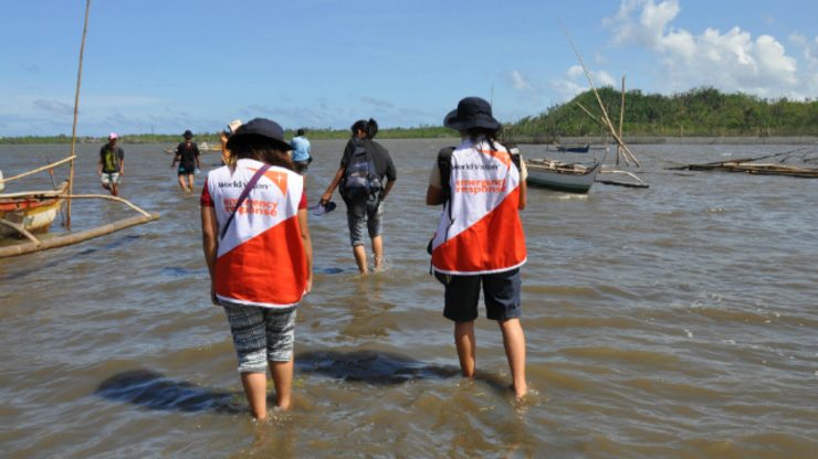 NO ISLAND TOO FAR. The author tags along with World Vision's local Haiyan Response team to document their activities. Photo by Joy Maluyo