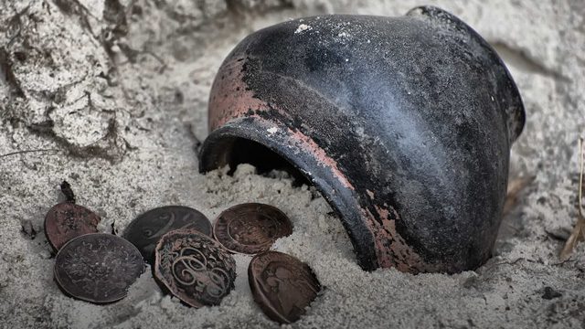 Ancient coins found in Greece’s mystery tomb