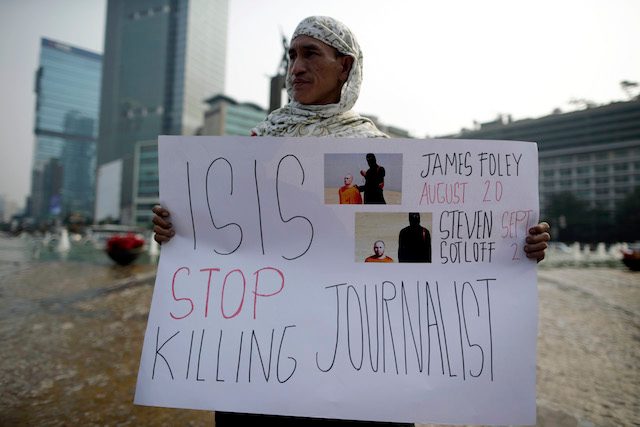 Jurnalis di Indonesia berunjuk rasa menentang pembunuhan jurnalis oleh militan ISIS, 5 September 2014. Foto oleh Mast Irham/EPA 
