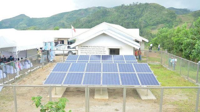 RURAL ELECTRIFICATION. San Carlos Solar Energy Inc installs solar panels in Camaniangan Elementary School in Negros Occidental in April 2014. Photo courtesy of San Carlos Solar Energy Inc 