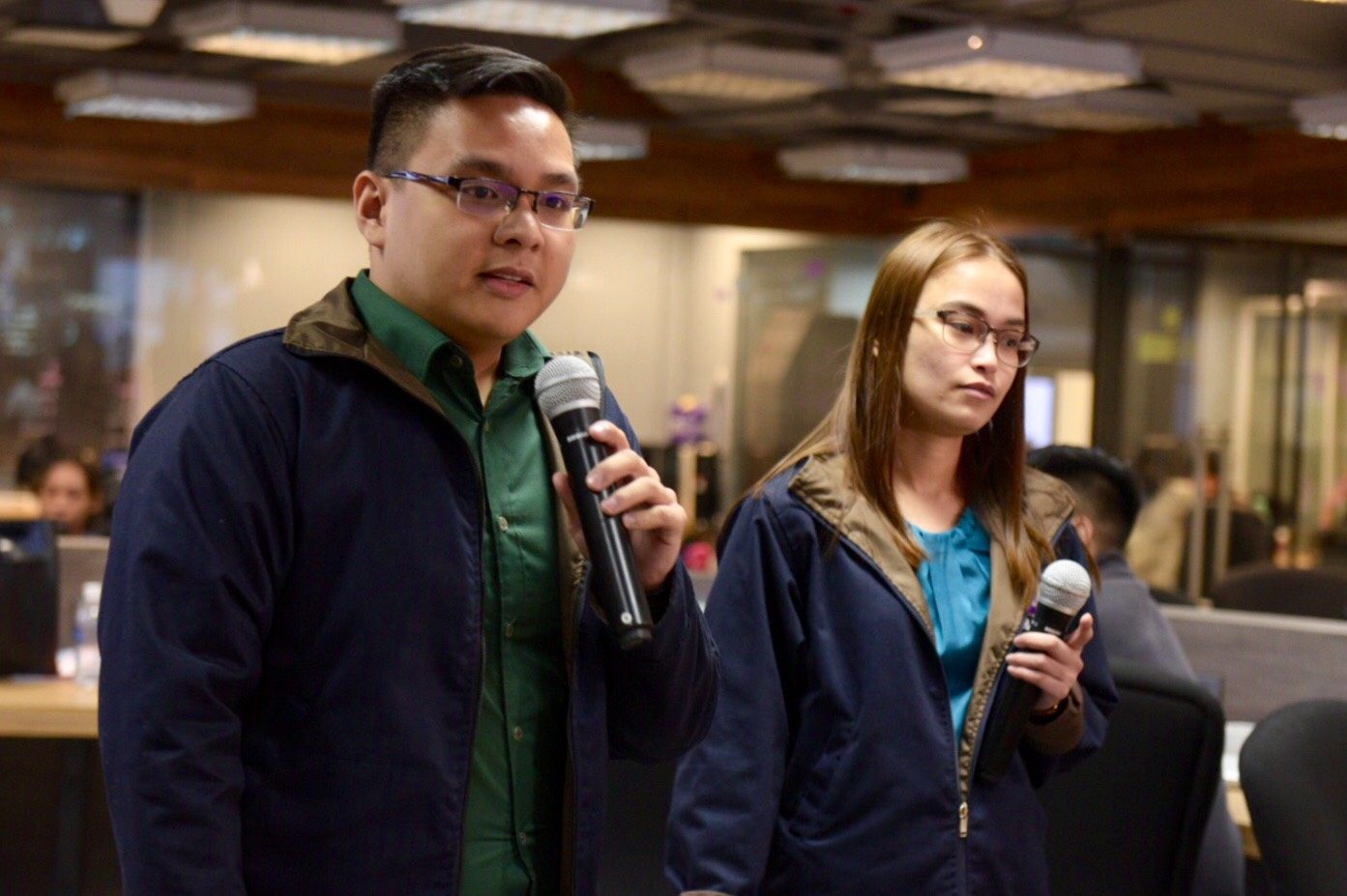 EMERALD DISTRICT. Henry Lachica (left) and Nesty Tumbaga (right) present their idea for Rappler's #HackSociety 2018. Photo by LeAnne Jazul/Rappler  