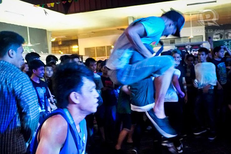 MOSH PIT. Fans do what they do at rock concerts: slam!