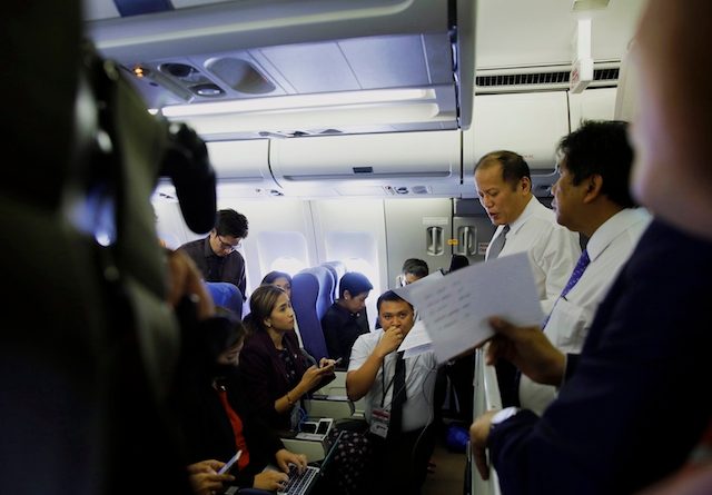 IN-FLIGHT INTERVIEW. President Benigno Aquino III fields questions from reporters in a chartered flight to Toronto, Canada, on May 8, 2015. File photo by Gil Nartea/Malacañang Photo Bureau    