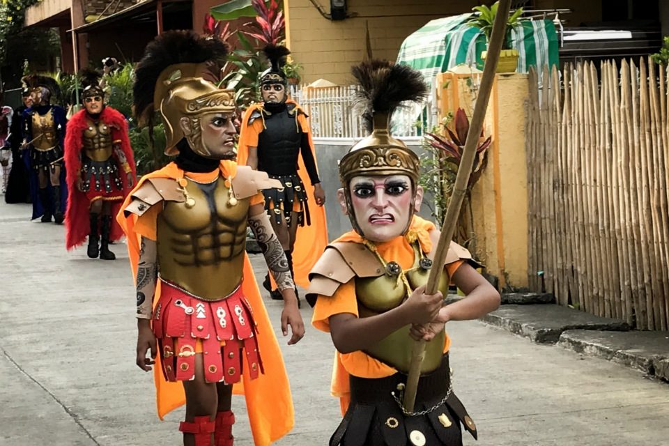 EARLY AGE. Kids wear morion as they marched on Maundy Thursday for the lenten parade.  
