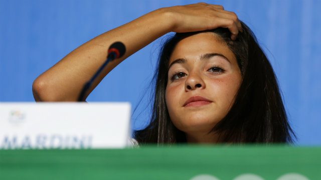 Yusra Mardini swam for her life to escape Syria a year ago. Now she'll swim to try and win a medal in Rio. Photo by Barbara Walton/EPA 