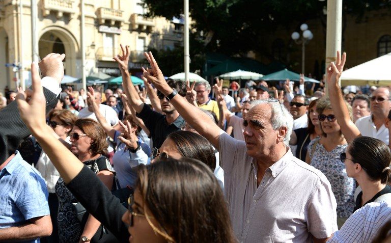 Slain Maltese journalist’s sons dismiss reward, tell PM to quit