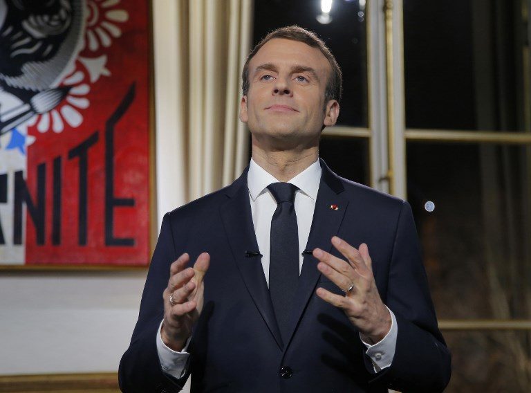 After yellow vest protests, Macron eyes referendum in May