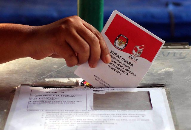 A ballot being cast during the July 2014 presidential elections in Indonesia. Photo by Dhana Kencana/EPA