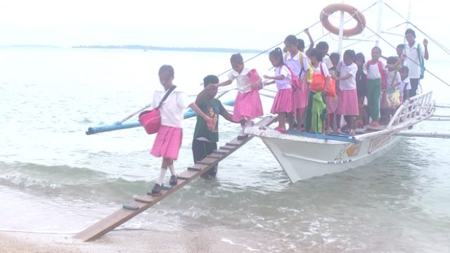 Students in Iloilo island-village brave sea to get to school