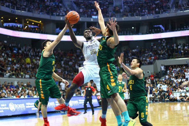 Aroga drives strong to the hoop - a common sight in the 77th Season of the UAAP. File photo by Josh Abelda/Rappler