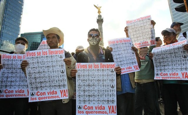 WHERE ARE THEY? Activists and relatives march during a protest against the disappearance of 43 students, asking the Government to speed up the search, in Mexico City, Mexico, 22 October 2014. Mario Guzman/EPA