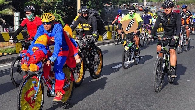 MODERN HEROES. Cyclists, some dressed as superheroes, ride their bikes to promote promote cycling as a means of sustainable transportation. Photo by Firefly Brigade    