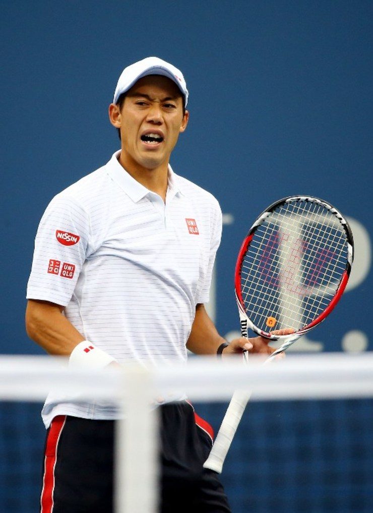 MISSED OPPORTUNITY. Kei Nishikori of Japan reacts against Marin Cilic of Croatia during their men's singles final match of the 2014 US Open on September 8, 2014 in New York City. Streeter Lecka/Getty Images/AFP