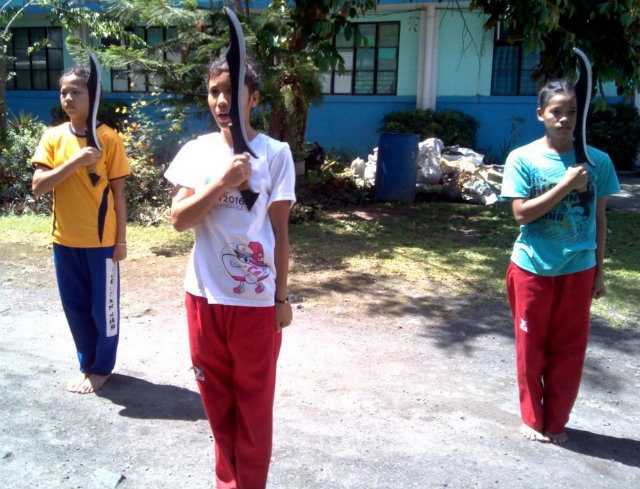 ANYO. ARMM secondary girls arnis do the salute before their synchronized anyo practice. Photo by Joji G. Ordona 
