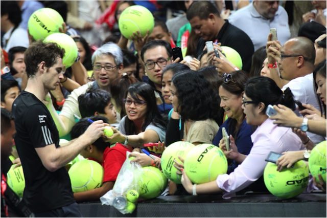 UP CLOSE AND PERSONAL. Andy Murray signs autographs for fans. 