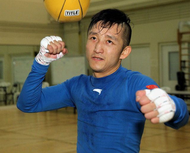 Zou Shiming is looking to become just the second pro boxing world titleholder from China. Photo by Chris Farina - Top Rank 
