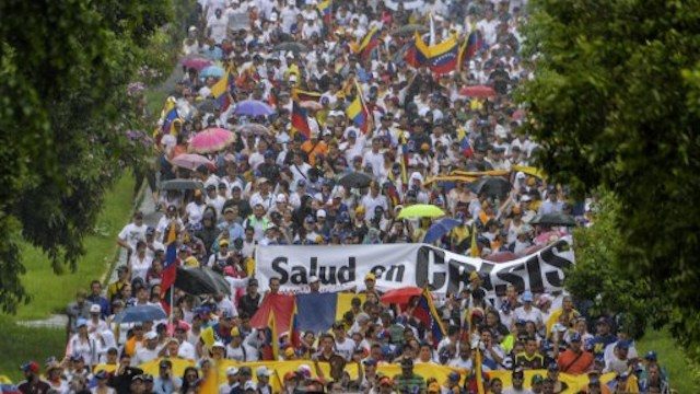 Up to 200,000 protesters march against Venezuela’s Maduro