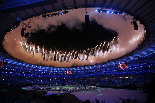 Fireworks illuminate the Maracana Stadium during the Opening Ceremony of the Rio 2016 Olympic Games in Rio de Janeiro, Brazil. Photo by Esteban Biba/EPA 