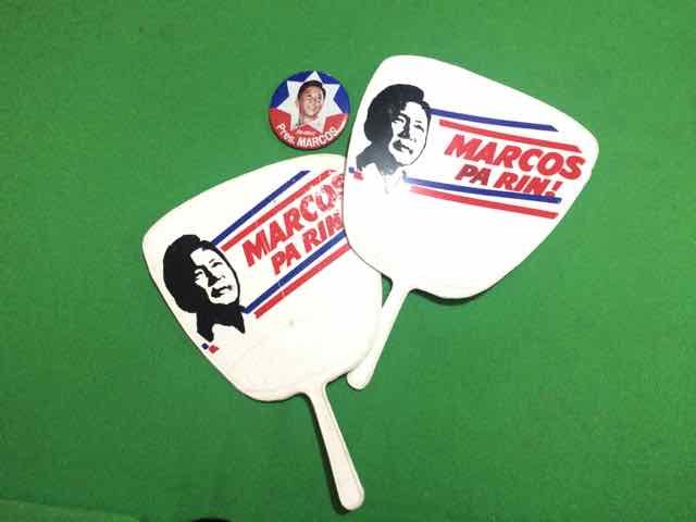 VINTAGE. Some old campaign paraphernalia of the late president Ferdinand Marcos. Photo by Patty Pasion/Rappler  