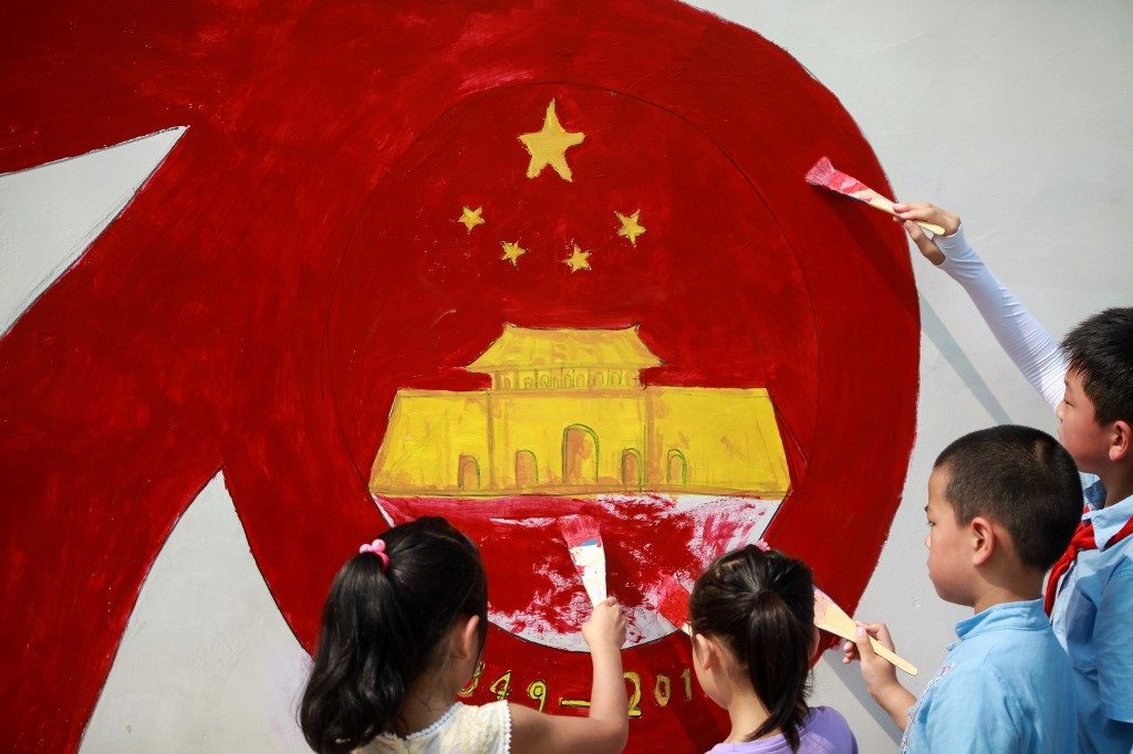 China plans triumphant 70th anniversary despite headwinds