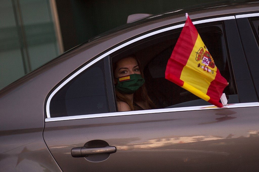 Thousands rally against Spain virus response, urge PM to quit
