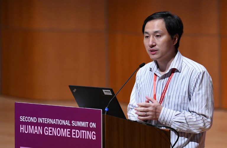 China scientist defends gene-editing babies but pauses trial