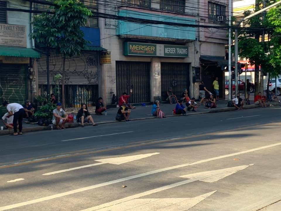HOMELESS DURING LOCKDOWN.  Around 200 homeless individuals who lined up to take a bath and get food at the Kalinga Center were not able to enter the center. Photo courtesy of Fr. Flavie Villanueva  