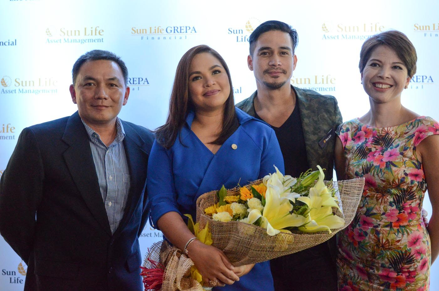 MONEY FOR LIFE. Judy Ann Santos-Agoncillo joins longtime Sun Life ambassador Piolo Pascual for the Money for Life campaign. The two stars are flanked by Gerry Tirona, Sun Life Grepa Financial, Inc. Marketing Head (left) and Mylene Daez-Lopa, Chief Marketing Officer for Sun Life of Canada (Philippines), Inc. (right). Photo by Alecs Ongcal/Rappler   