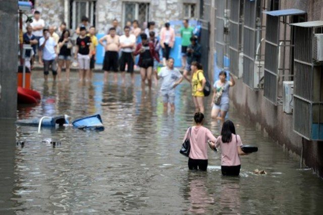 4 officials suspended over deadly China flooding