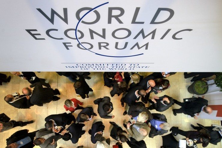 France attacks, Iraq conflict to dominate Davos meet