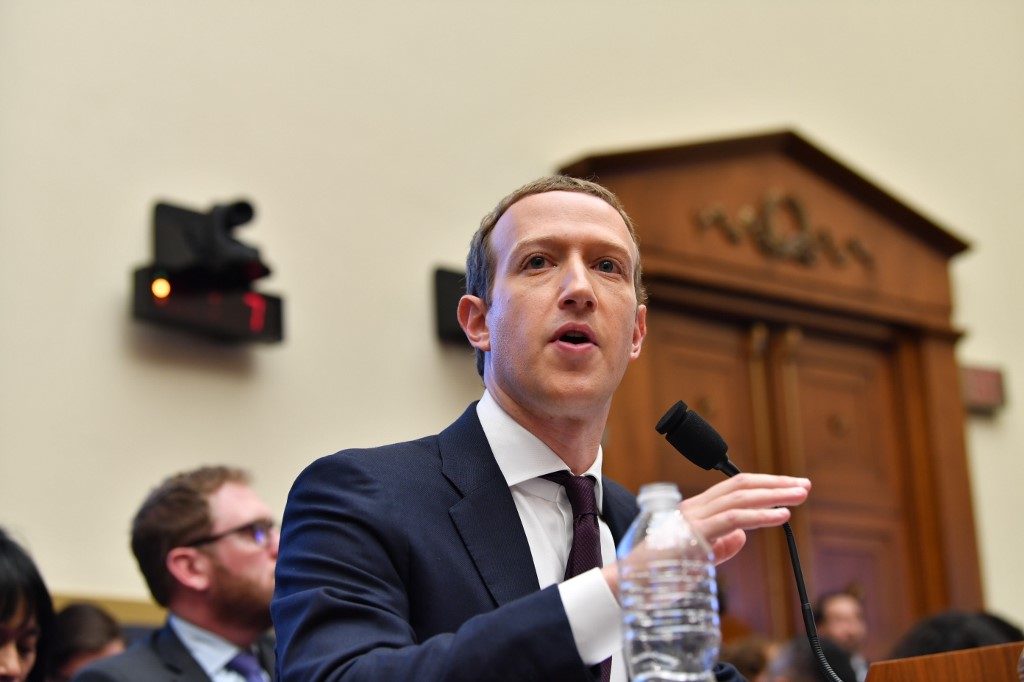 ZUCKERBERG. Facebook Chairman and CEO Mark Zuckerberg testifies before the House Financial Services Committee as the company continues to face controversies left and right. 
Photo by Nicholas Kamm/AFP 