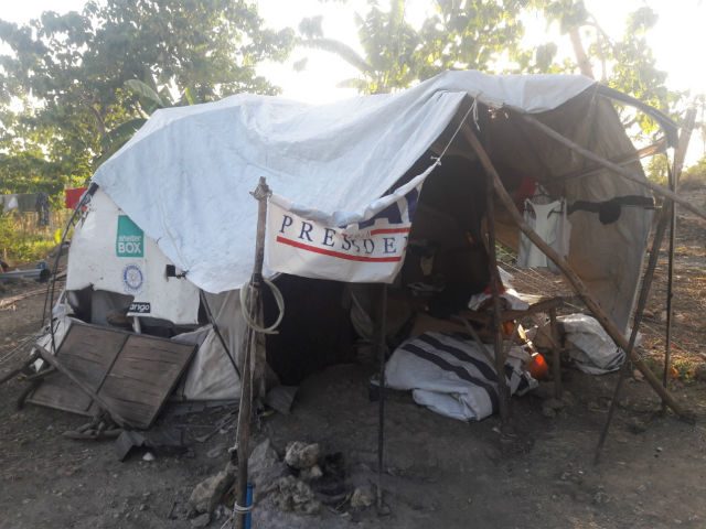 MAKESHIFT HOME. Tents housing Yolanda survivors haven't disappeared in Daanbantayan, Cebu. Photo by Richale Cabauatan/Rappler 