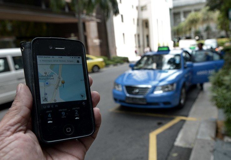 Uber-heated battle as mobile apps rattle Asia’s taxis