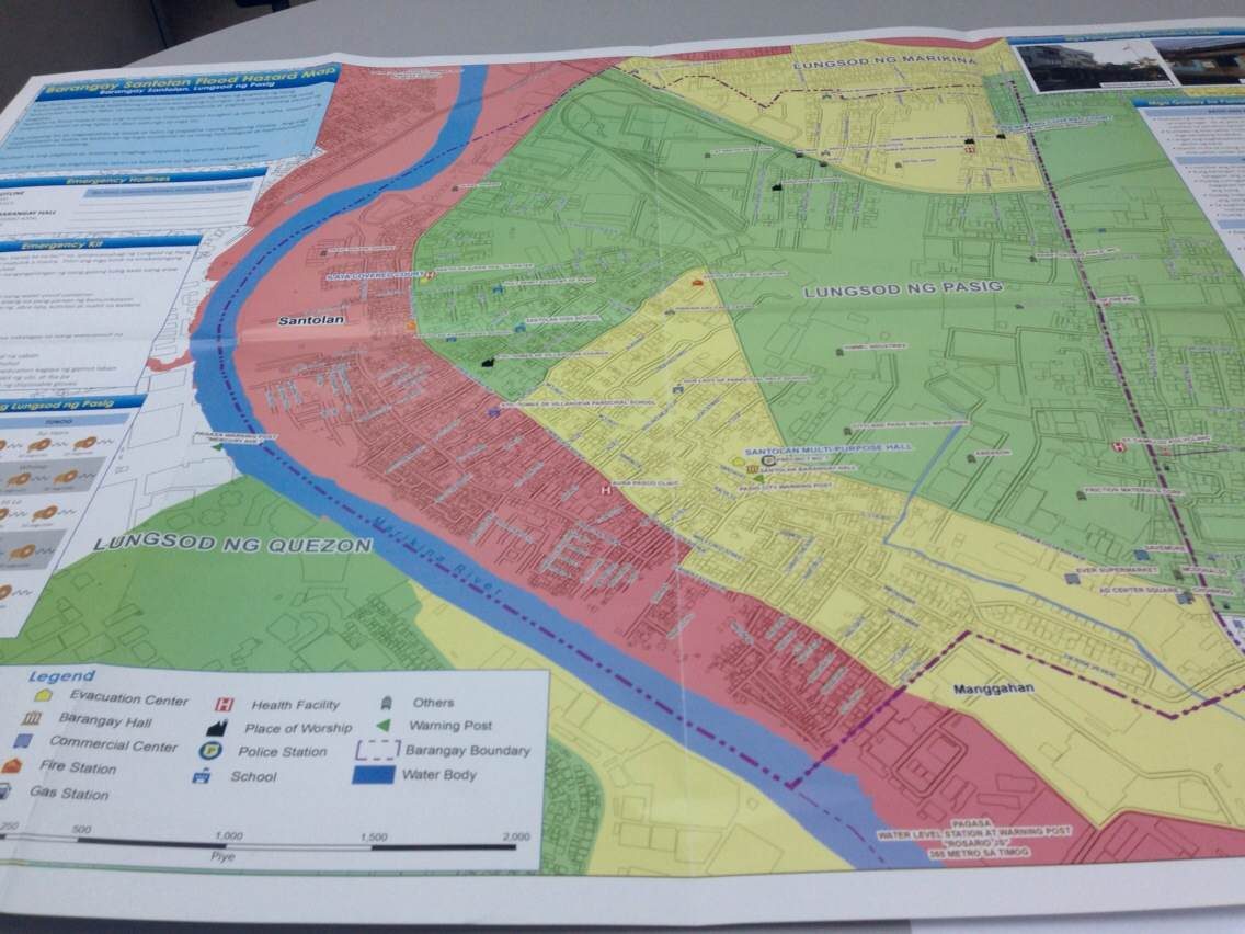 PUBLIC INFORMATION. A flood hazard map for Barangay Santolan, one of the flood-prone communities of Pasig City. (Red - 6 feet or more flooding. Yellow - 2-6 feet. Green - below 2 feet.)