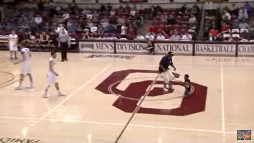 WATCH: Kid runs on court during college basketball game
