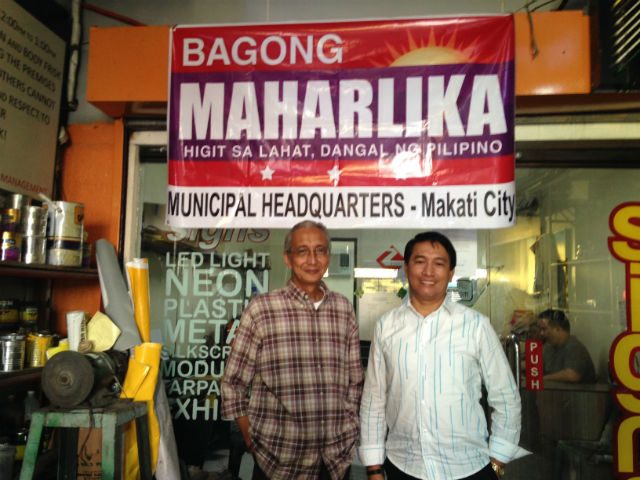 BAGONG MAHARLIKA TANDEM. Edgardo Padrigon and Jimboy Jumawan pose outside their Partido Bagong Maharlika's municipal headquarters in Makati. Photo by Mara Cepeda/Rappler  