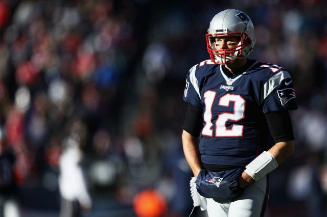‘Walking legend’ Tom Brady seizes all-time win mark