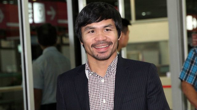 PAC-KETBALL. Manny Pacquiao smiles on arrival at The Venetian in Macau ahead of his kick-off press conference. Photo by Chris Farina - Top Rank